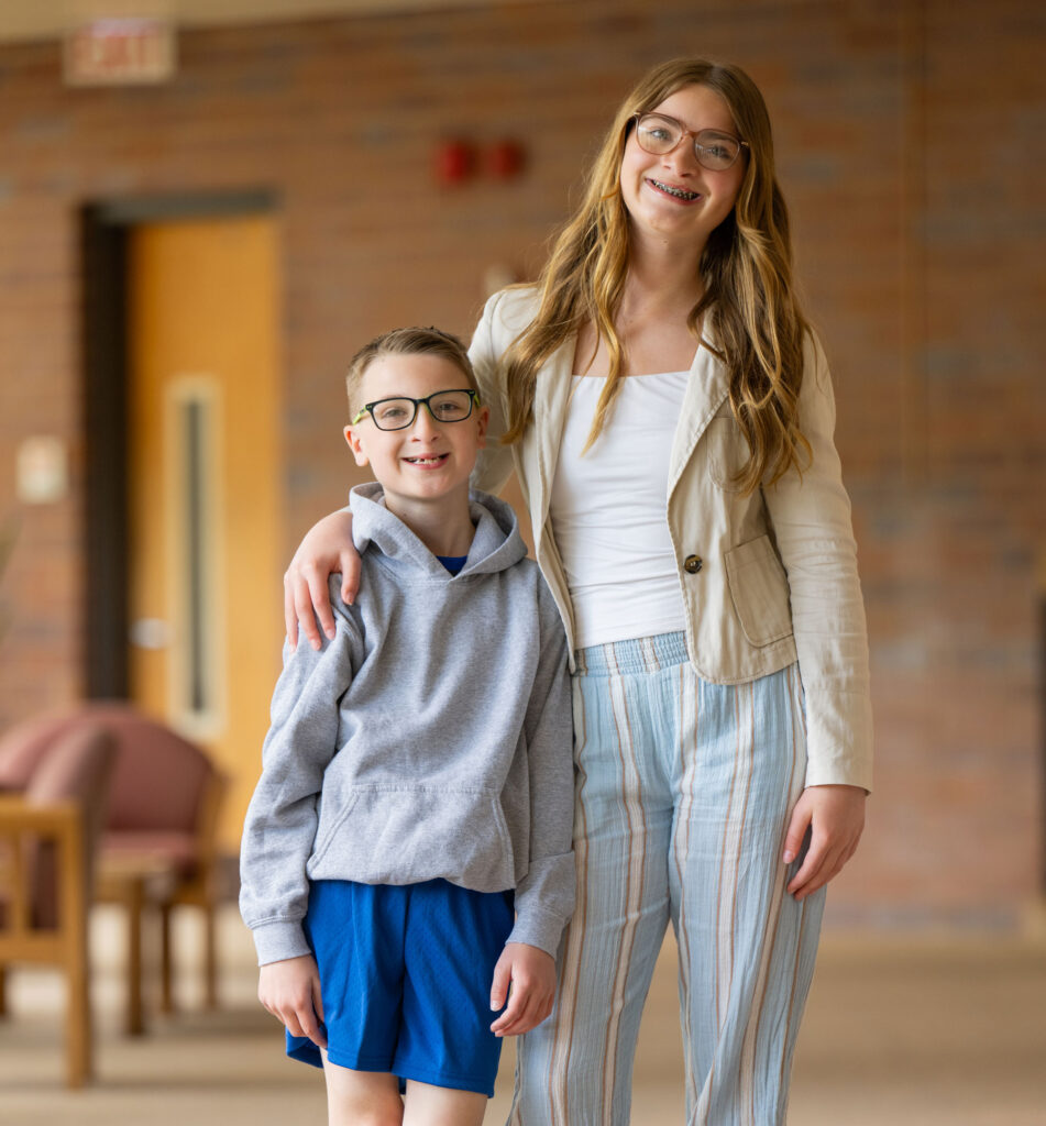 Boy and girl stand together
